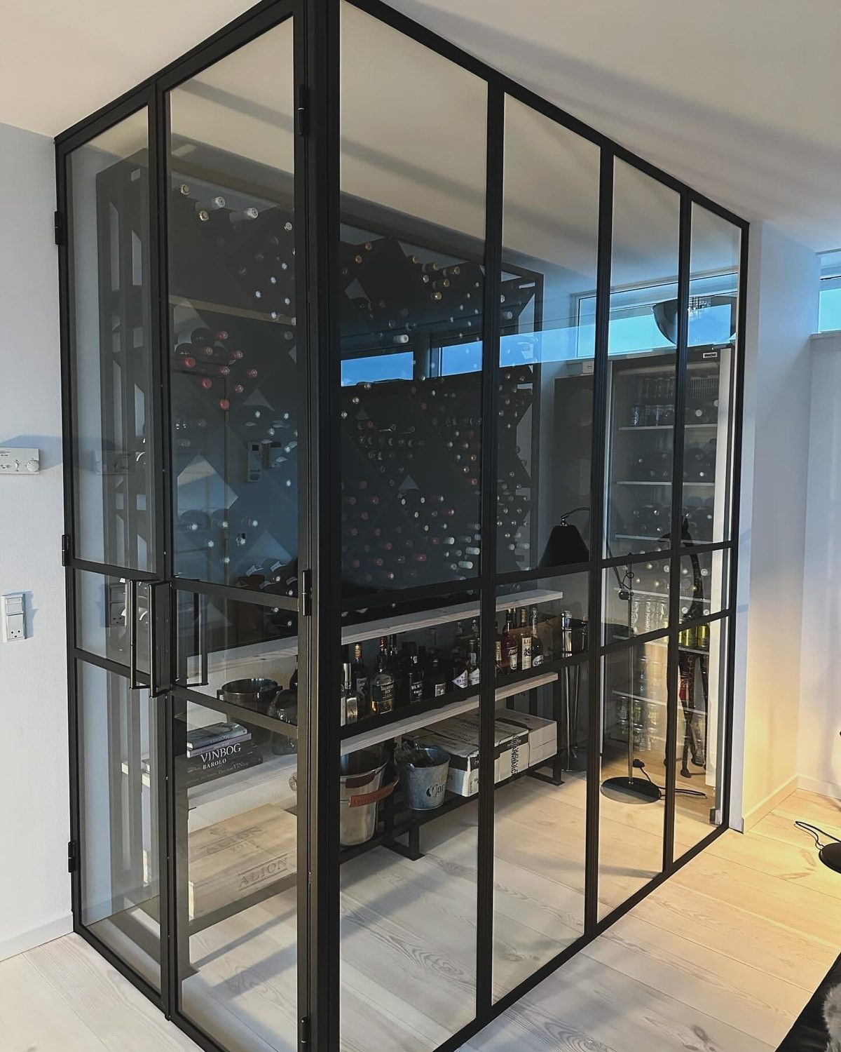 Slim steel-framed interior door.