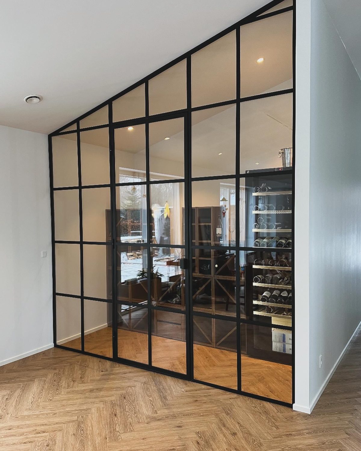 Architectural partition designed to shape light.